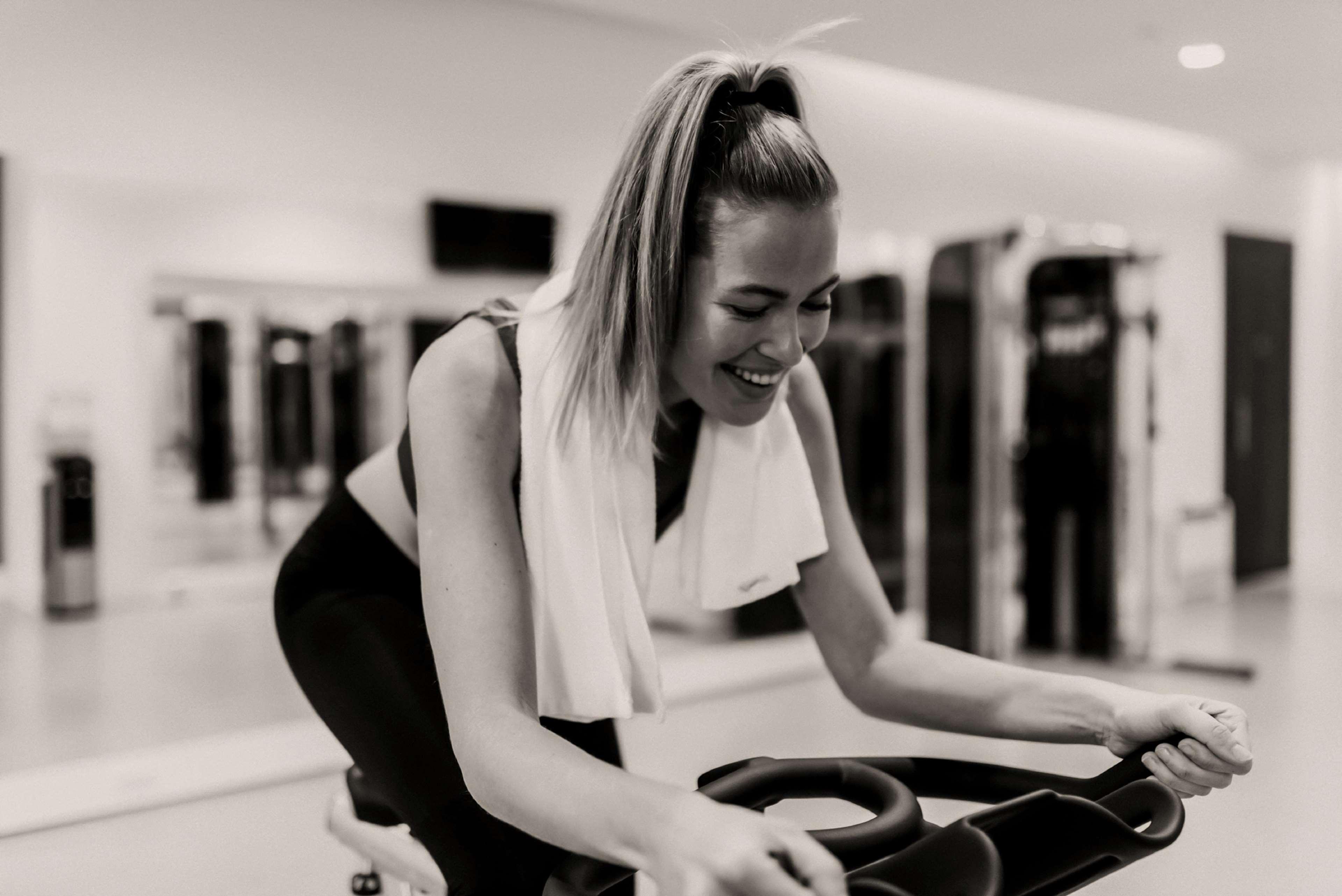 Hilton Rotterdam Hotel Exterior photo A woman on a stationary bicycle